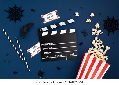 Movie Clapperboard And Halloween Decoration. Horror Movie Night, Halloween Party Invitation. Top View, Copy Space, Mockup