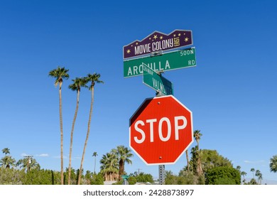 Movie Colony East street sign in residential neighborhood in Palm Springs, California