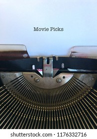 MOVIE PICKS Title Caption Typed In Black On White Paper On Obsolete Old Fashioned Vintage Typewriter Machine