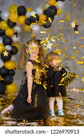 Movie Super Star Girl Model Posing In Studio Shoot With Golden Star And Colorful Baloons Wearing Stylish Gold Airy Dress With Shining Bow Tie.Super Star Pillow Deisigned By Photographer