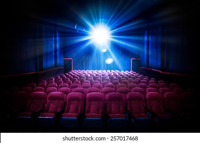 Movie Theater with empty seats and projector / High contrast image - Shutterstock ID 257017468