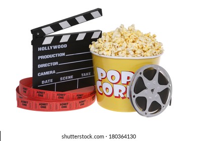 movie theater still life with popcorn, movie reel, tickets, and cut board on white  - Powered by Shutterstock