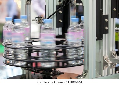 Moving Bottles on Labelling machine for Industry