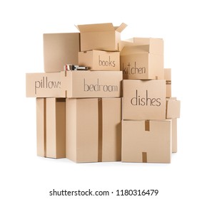 Moving boxes and adhesive tape dispenser on white background - Shutterstock ID 1180316479