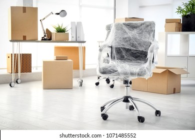 Moving Boxes And Furniture In New Office