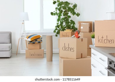 Moving boxes and household stuff indoors. Space for text - Shutterstock ID 1178511649