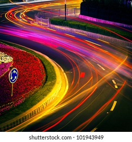 Moving Car With Blur Light Through City At Night