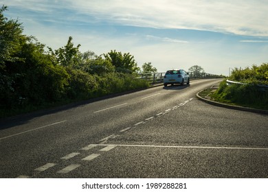 Moving Car On Uk Motorway Road Countryside Junction In England