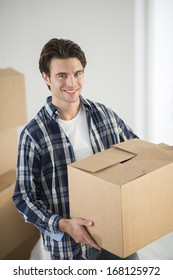 moving cardboard boxes - Shutterstock ID 168125972
