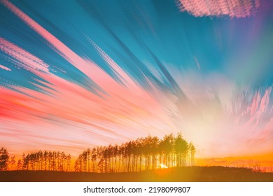 Moving Clouds Trails In Morning Sky. Sunrise Sky Natural Background. Bright Sunlight Shining Through Trees. Amazing Effects Of Smeared Fantasy Clouds. Abstract Colors. Long Exposure. Flight Of Fancy.