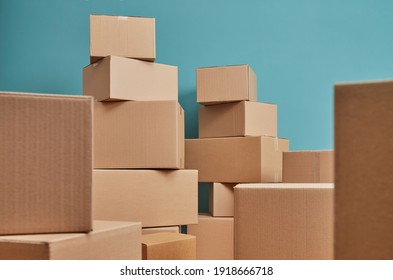 Moving concept with cardboard boxes in room