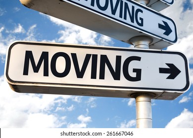 Moving direction sign on sky background