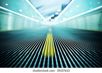 Moving Escalator In An Airport