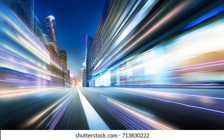 Moving forward motion blur background with light trails ,night scene .
