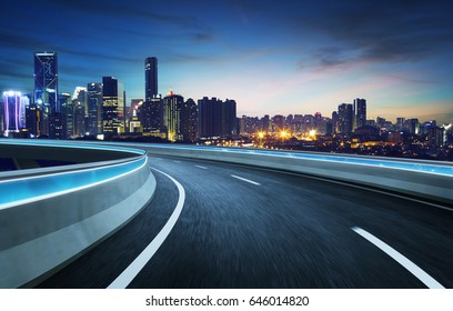 Moving Forward Motion Blur Flyover With City Skyline ,night Scene .