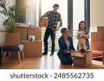 Moving, parents and portrait of child in new home bonding together for family time with teddy bear. Happy, mortgage and girl kid play with mom and dad for fun and unpacking cardboard boxes for house.