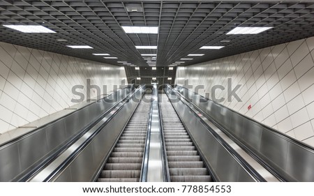 Moving stairs in underground.Escalator stairs in metro station.