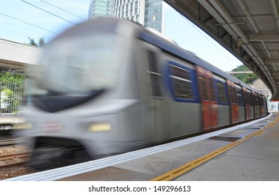 Moving Train In Hong Kong At Day