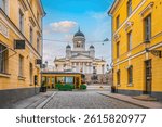 Moving tram and Helsinki Cathedral in the centre of Helsinki, Finland at sunset
