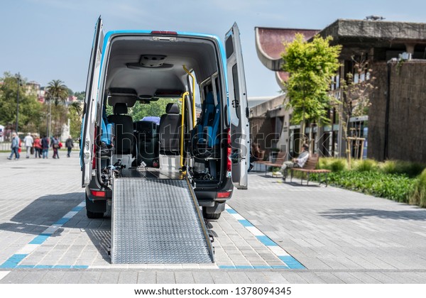 moving van with ramp for the\
transport of disabled people  or van to transport disabled people\
or mobility van for disabled people or van for handicapped people\

