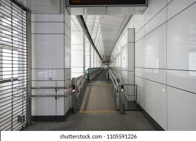 A Moving Walkway Or Moving Sidewalk Is Installed Along The Underground Street In Shinjuku. It Stops The Operation Early In The Morning.
