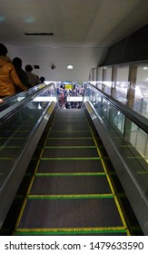Moving Walkway Turns Into Escalator, Tokyo, Japan.