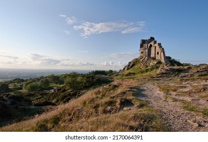 Mow Cop Castle, Cheshire Staffordshire, England In Sunlight With Blue Sky, Clouds And Distant Landscape; Landscape Format.