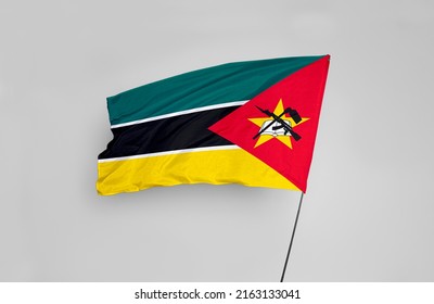 The Mozambique flag is isolated on a white background with a clipping path. flag symbols of Mozambique. flag frame with empty space for your text.