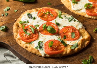 Mozarella Basil And Tomato Flatbread PIzza On Naan Bread