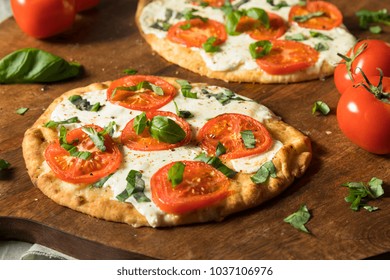 Mozarella Basil And Tomato Flatbread PIzza On Naan Bread