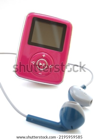 mp3 music player device over white background    