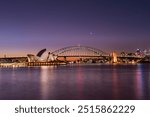 mpressive view of the Sydney Harbour Bridge and the iconic Sydney Opera House, symbols of Australia’s architectural and cultural beauty.”