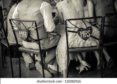 Mr. And Mrs. Chairs At Wedding