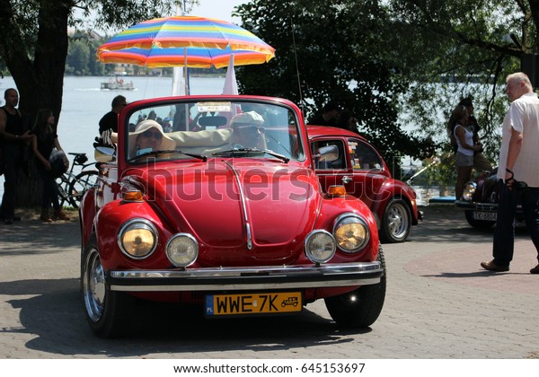 Mragowo, Poland, festival Piknik Country &\
Folk Mragowo, parade vehicles, July 28, 2013: Historic, old, retro\
car VW volkswagen\
beetle