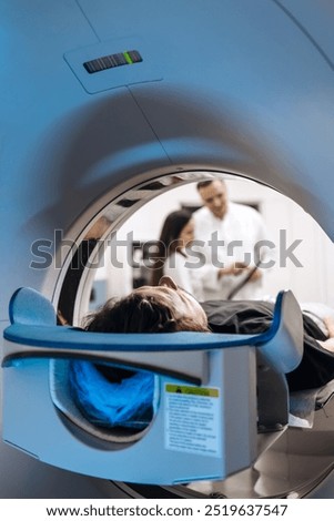 An MRI machine is positioned in a hospital, showcasing advanced imaging technology. This essential equipment is crucial for detailed diagnostics, reflecting the hospital's commitment to quality patien