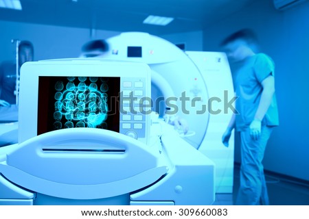 MRI scan on the monitor of patient`s head