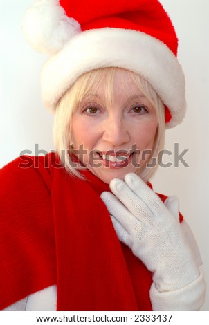 Mrs Santa - Blonde woman wearing Santa hat and red shawl.