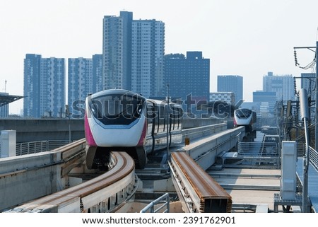 MRT pink line new train in Bangkok at Nonthaburi Civic Center station with signs , Information board