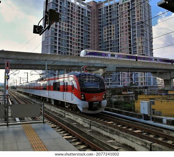MRT\
Purple Line and Red Line train running .That runs from Bang Sue to\
Rangsit station,Bangkok,May 9,2021,blurry image\
