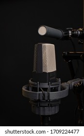 MS (Mid-Side) Stereo Microphone Configuration with One Small-Diaphragm Cardioid Condenser Microphone and one Large-Diaphragm Condenser Microphone set to Figure 8 Polar Pattern, Quarter View
