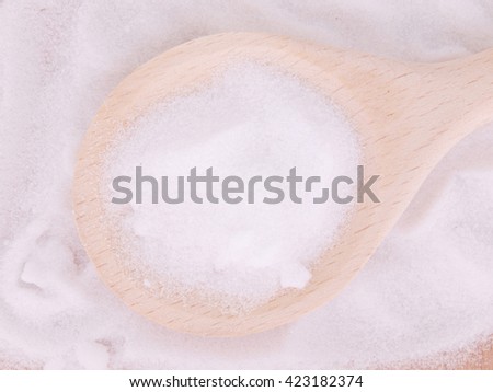 MSM pure powder in wooden spoon
