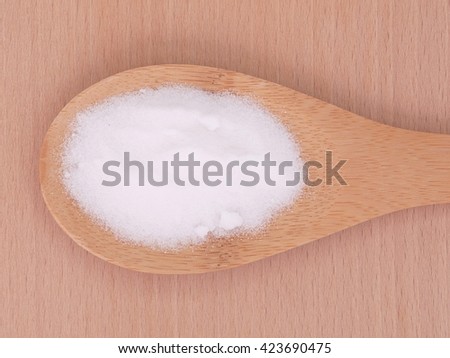 MSM pure powder in wooden spoon