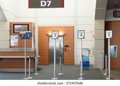 MSY, Louis Armstrong New Orleans International Airport, New Orleans, LA, USA - October 15, 2015:  Boarding Gate And Priority Lane Markers