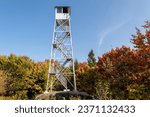 Mt Arab fire tower in Adirondacks surrounded by fall foliage 