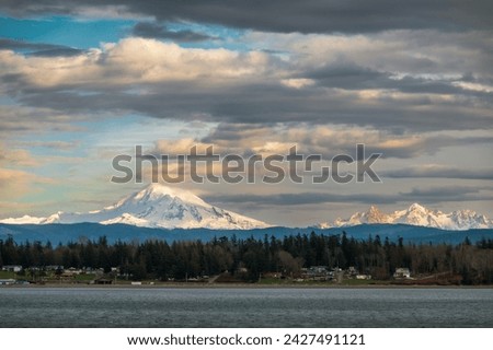 Mt. Baker and the Twin Sisters located in the Cascade Mountain range. Twin Sisters Mountain is located southwest of Mount Baker, separated from the volcano by the Middle Fork of the Nooksack River.