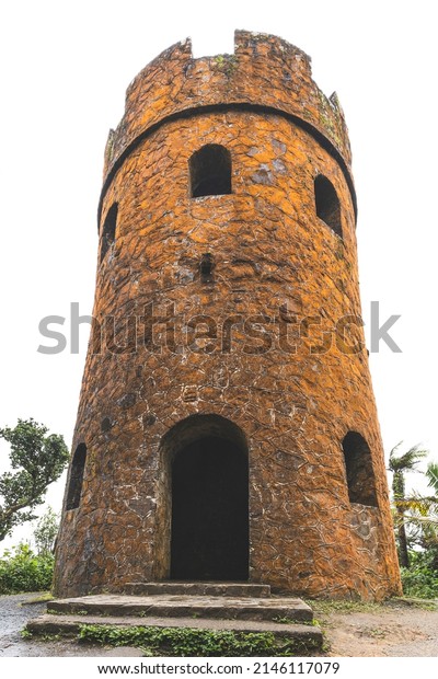 Mt. Britton lookout tower in El\
Yunque Rainforest. Built of stone, the tower was built by the\
Civilian Conservation Corps in 1937-38, low angle vertical\
view