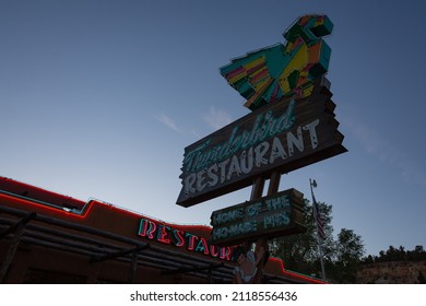 Mt Carmel Junction, Utah - May 18, 2020: The Historic Thunderbird Restaurant Sign At Dusk, On The Side Of The Highway.