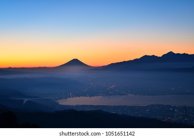 Mt. Fuji over Lake Suwa at Dawn