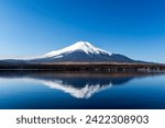 Mt. Fuji with reflection at Yamanaka lake, Yamanashi, Japan