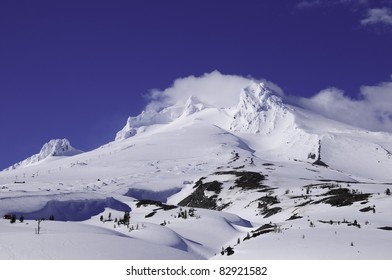 Mt. Hood Covered In Snow With Ski Lifts